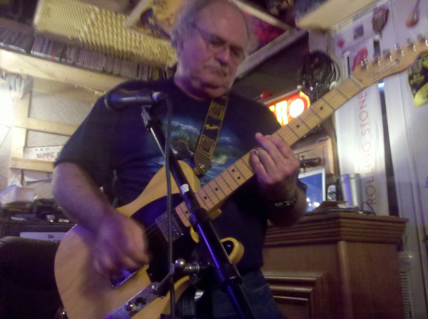 Dad rockin' out on guitar.